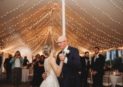 string lighting above father daughter dance