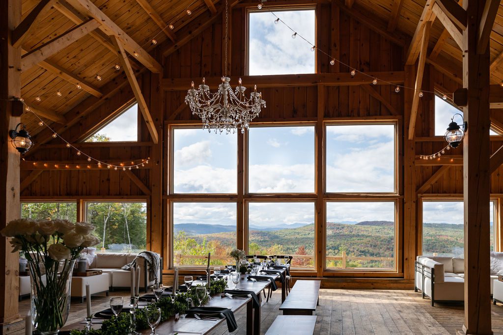 daytime mountain barn wedding