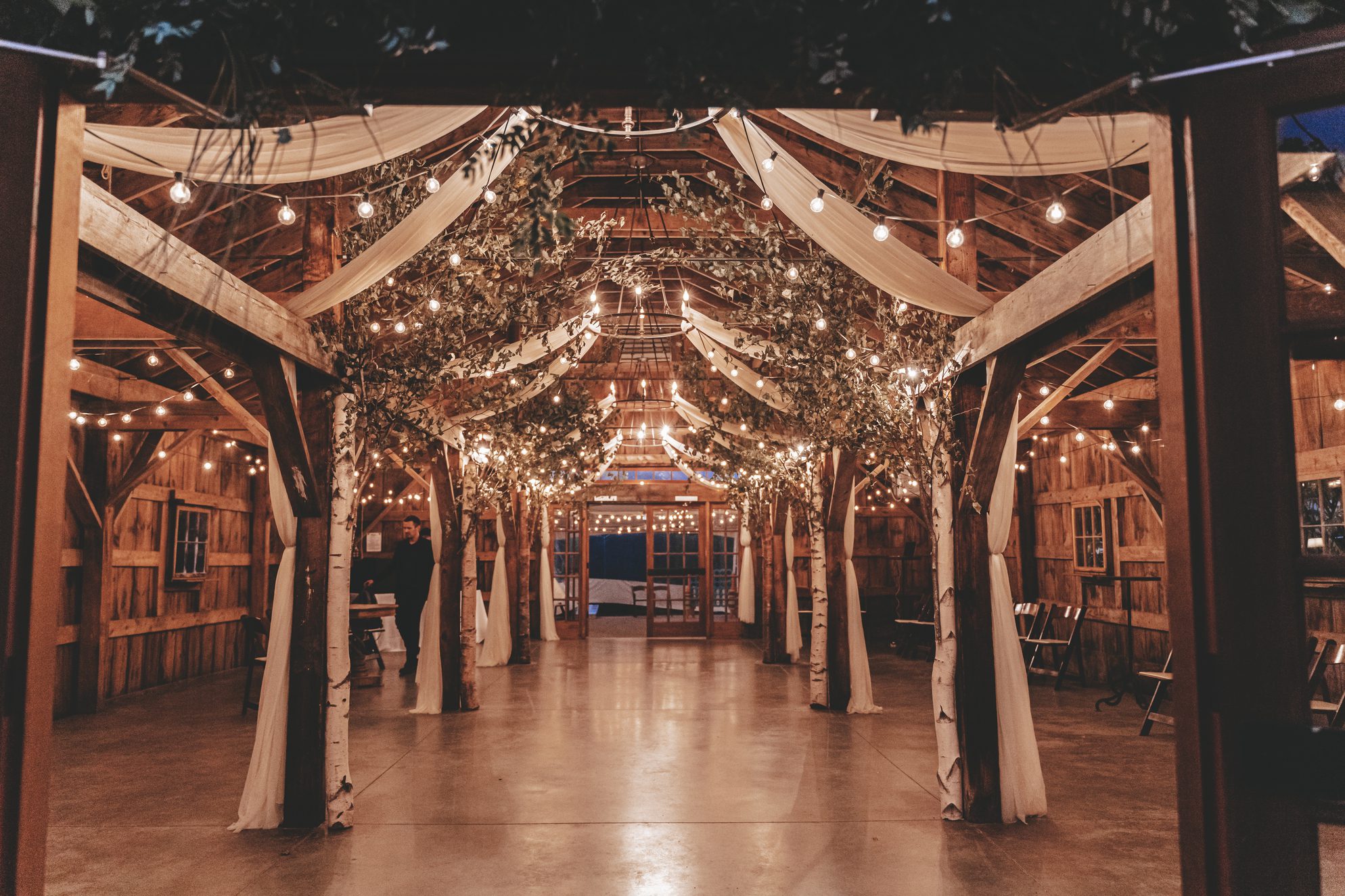 barn wedding bistro lights
